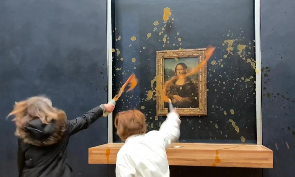 People Throwing Food At The Mona Lisa